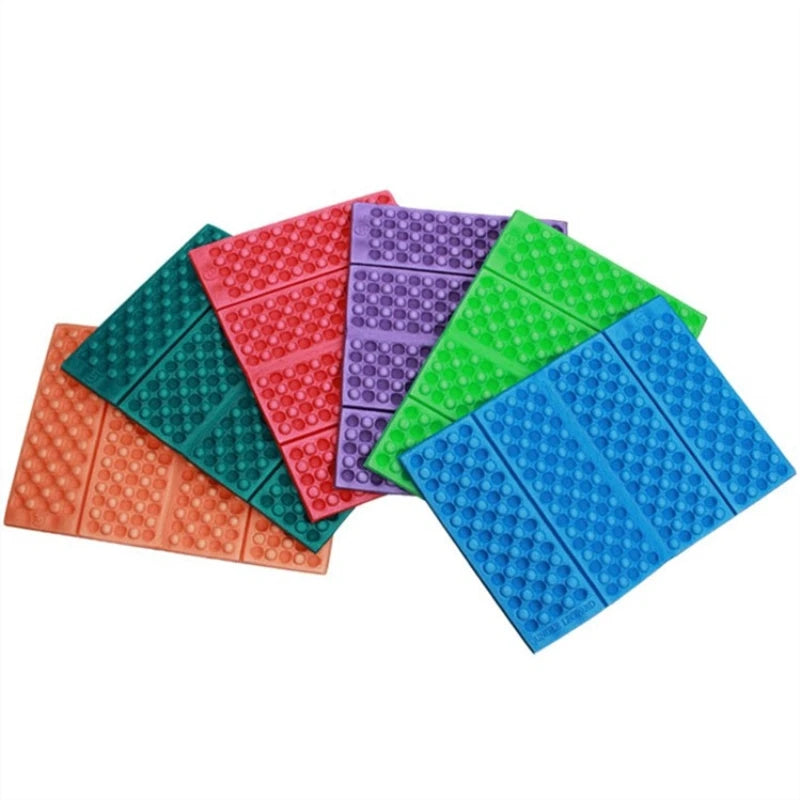 Portable, moisture-resistant cushion pad for outdoor activities like camping, hiking, and picnics. This folding seat pad is designed to keep you dry and comfortable.