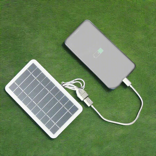 5V 2W Portable Solar Panel with USB for Safe Charging. Ideal for charging power banks and phones while camping or at home.