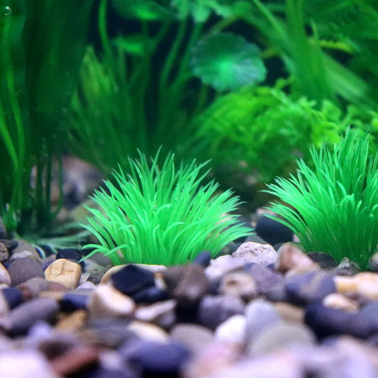 Fake green underwater plants for aquariums, designed to look like real aquatic grass, perfect for decorating fish tanks.